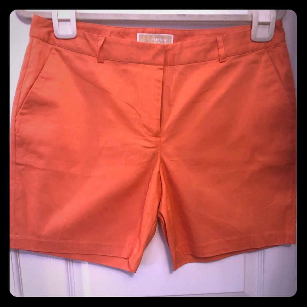 Michael Kors Orange shorts.